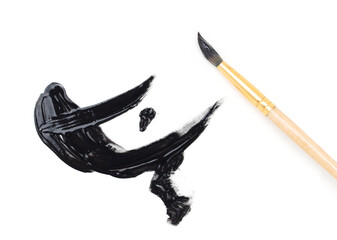 Black paint smeared with a brush on a white background.