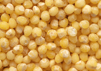 Close-up of millet groats as background.