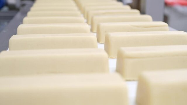 Molded Marzipan blocks rolling of a factory production line