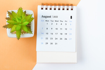August 2022 desk calendar with tree pot.