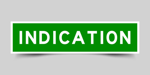 Sticker label with word indication in green color on gray background