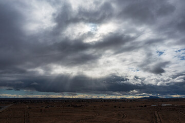 Fototapeta na wymiar storm clouds over the desert plains