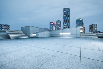 Panoramic skyline and modern commercial office buildings with empty square floors in Beijing at...