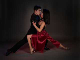 tango couple of latin woman and asian man