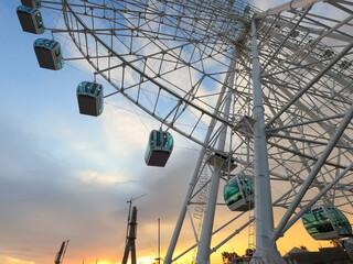 Ferris wheel in Foz do Iguaçu, Brazil at sunset.