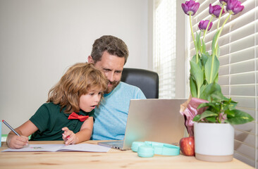 family blog. boy do homework with private teacher. webinar video lesson. online education