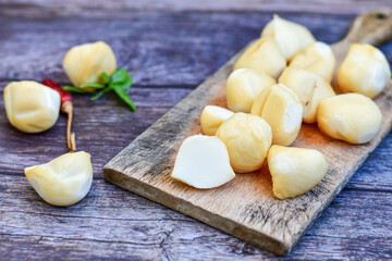  Smoked mini  traditional italian provola  cheese  on wooden background