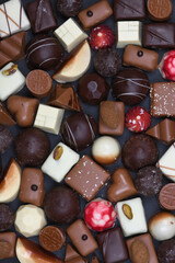 Handmade or homemade chocolate or bon bon. A heart of chocolate. love for valentine, mothersday or for gift at christmas.