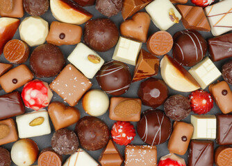 Handmade or homemade chocolate or bon bon. A heart of chocolate. love for valentine, mothersday or for gift at christmas.