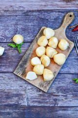  Smoked mini  traditional italian provola  cheese  on wooden background