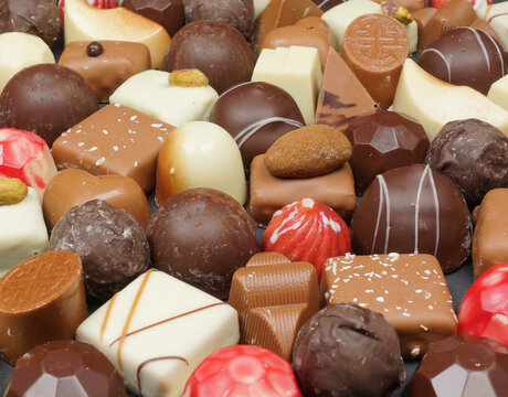 Handmade or homemade chocolate or bon bon. A heart of chocolate. love for valentine, mothersday or for gift at christmas.