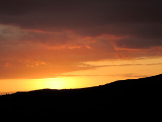 Sun Hiding in the Crimson Haze