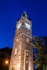 Fototapeta na wymiar Night view of Stefan's Tower, medieval monument in Baia Mare city, Maramures, Romania