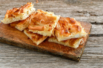 Bakery .Home made  cheese pie  with phyllo pastry, feta cheese  and organic eggs. Bulgarian banitsa