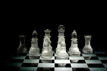 Glass chess on glass chessboard	