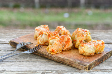 Cabbage rolls with meat, rice and vegetables. Stuffed cabbage leaves with  ground beef. Known as sarma, golubtsy, dolma.