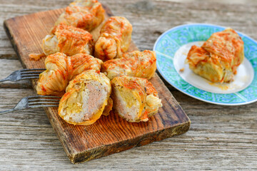 Cabbage rolls with meat, rice and vegetables. Stuffed cabbage leaves with  ground beef. Known as sarma, golubtsy, dolma.