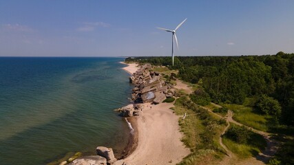 wind turbines in the seas coast and ruins 