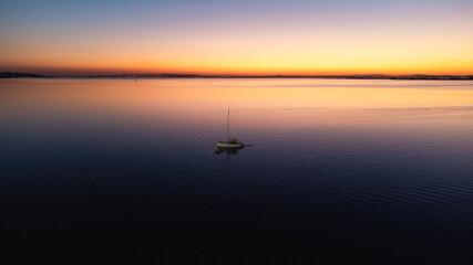 Fototapeta premium boat at sunset