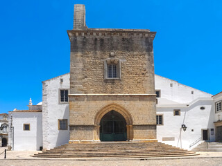 Fototapeta na wymiar Cathedral of Faro or Se catedral de Faro with a bell tower at the Algarve coast of Portugal