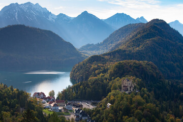 Fototapeta na wymiar View from Iconic Neuschwanstein Castle during Autumn With Changing Leaves Overlooking historic village and Hohenschwangau Castle