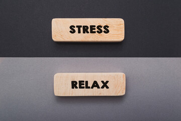 Concept word stress relax on wooden blocks.