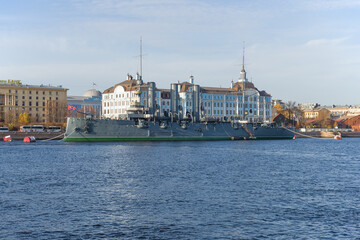 SAINT PETERSBURG, RUSSIA - OCTOBER 25, 2019: Old cruiser "Aurora" at Petrogradskaya embankment on a sunny October day