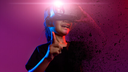 Obraz na płótnie Canvas happy girl in glasses of virtual reality. Augmented reality, science, future technology concept. VR. Futuristic 3d glasses with virtual projection. Neon light.
