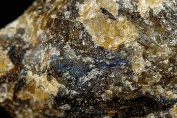 macro mineral stone Labradorite on a black background