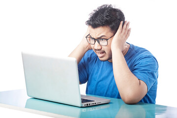 student shrieking expression by looking at laptop screen, surprised expression of a student in...