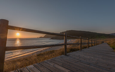 Last view of the sun at Finisterre Beach, endpoint of the Camino de Santiago