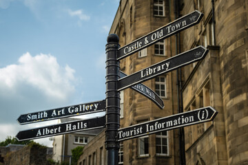 Sign post highlighting the directions to attractions in stirling town centre