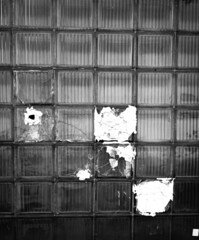 Glass bricks. Broken window. Black and white.