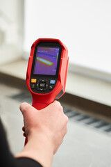 Thermal imaging device for inspection of heating equipment. Heat Loss Detection of radiator  with Infrared Thermal Camera