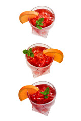 Red fresh drink with ice, grapefruit and mint isolated on white. Space for text or design.