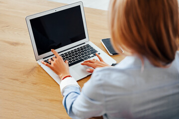 workplace girl typing on laptop computer text string search   