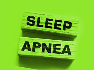 Sleep apnea words on wooden blocks. Sleep disorders healthcare concept