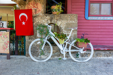 Bicycle at cafe with flag of Turkey