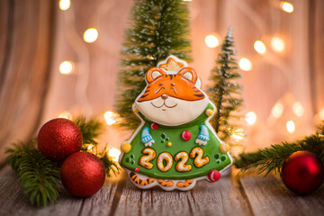 Beautiful postcard with toy tiger. Tiger 2022. Christmas composition with diy tiger.