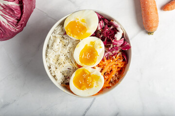 Vegetarian bowl with basmati rice and boiled eggs