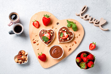 Breakfast for two, Valentines day food for couple in love with chocolate toasts and strawberry
