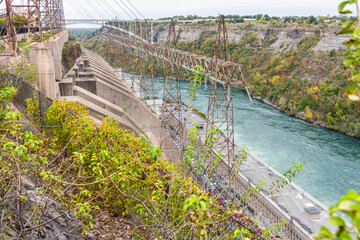 Hydroelectric power station on a deep narrow gorge on a cloudy autumn day. Niagara Falls, ON, Canada.