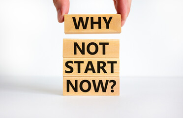 Why not start now symbol. Concept words Why not start now on wooden blocks. Businessman hand. Beautiful white table, white background, copy space. Business and why not start now concept.