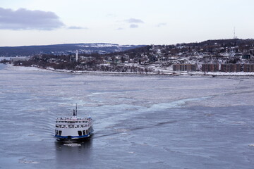 High angle view of the ferry across the St. Lawrence River arriving in Quebec City from Levis...