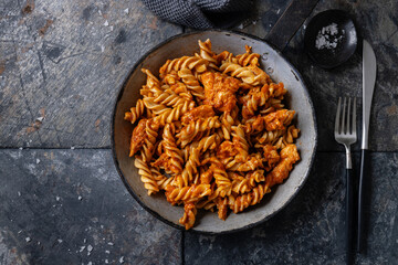 Noodles with tomato sauce and meat