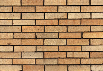 Brown brick fence. Background and texture.