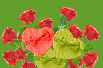 Beautiful red roses and gift boxes with bow on green isolated background close up