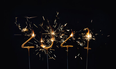 Goodbye 2021 Burning sparklers decoration dark background