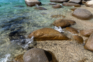 Lake tahoe water, sand, and rocks, beauty of one of the most beautiful places in the world