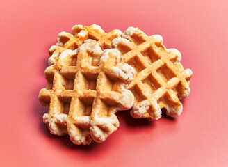  Bunch of delicious waffles over red background
